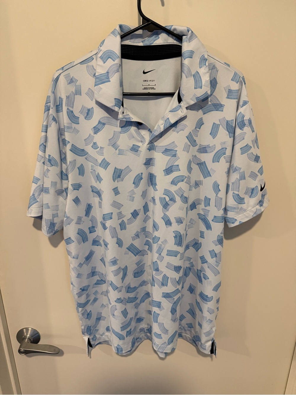 Nike Men’s White Polo with Light Blue Abstract Print